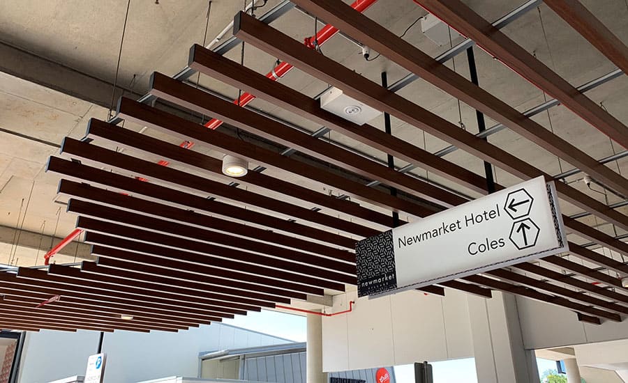 brush box ceiling beams design outside newmarket hotel walkway