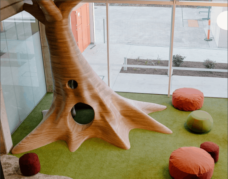 beautiful tree made from plywood for children's library